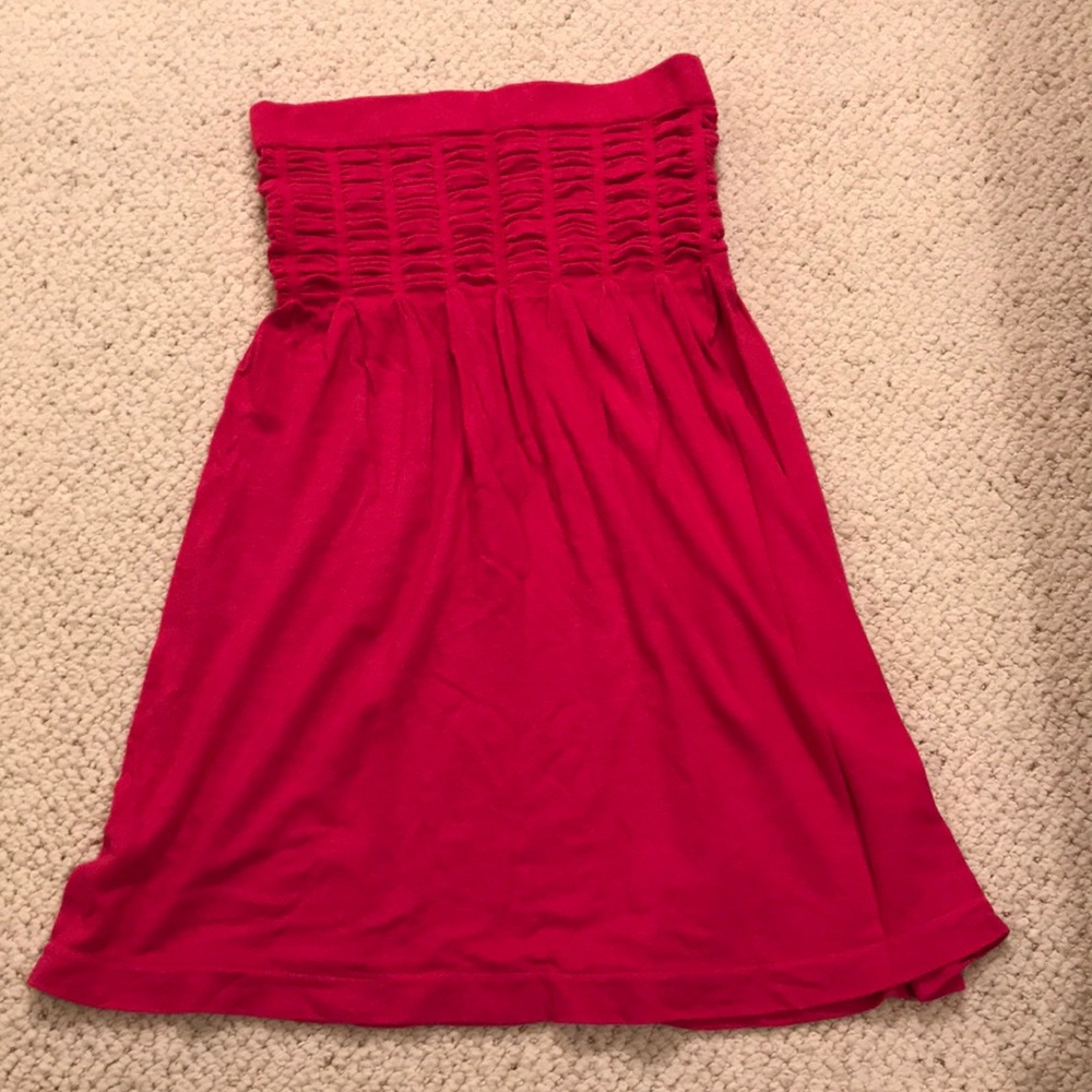 Hot pink strapless top.